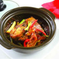 Thưởng thức cá trê kho nghệ
